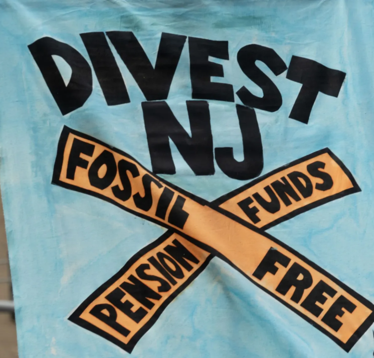 Flag saying Divest NJ with text FOSSIL FREE and PENSION FUNDS